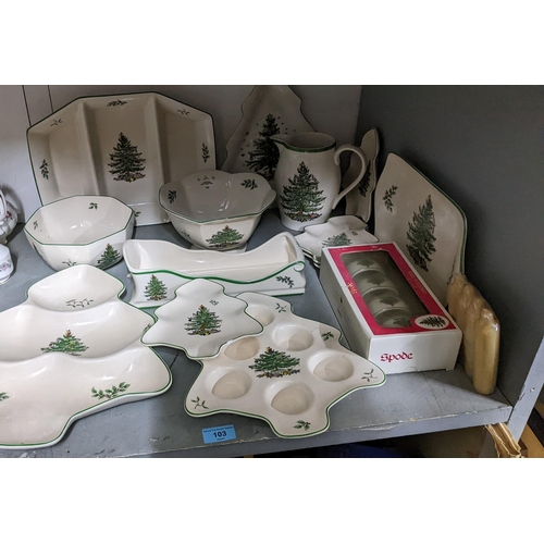 103 - A collection of Spode Christmas tree table wares to include a boxed set of four napkin rings, dishes... 