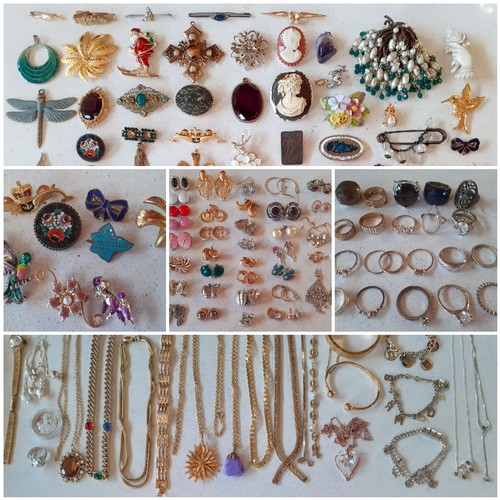 128 - A collection of vintage brooches, pendants and clip-on earrings to include a gold tone Sarah Coventr... 