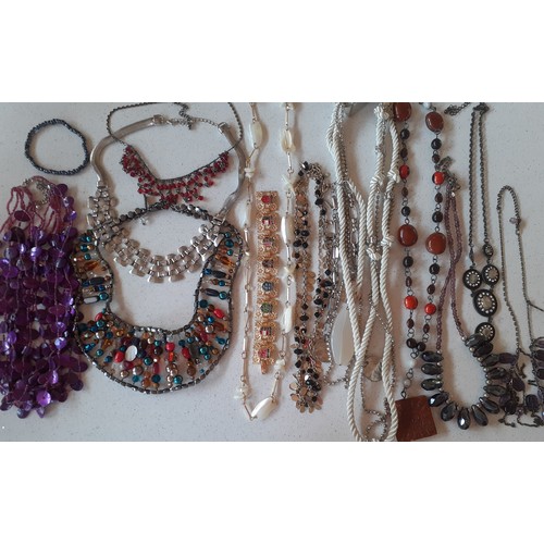 127 - A large quantity of modern and vintage fashion jewellery comprising unused High Street jewellery, mi... 