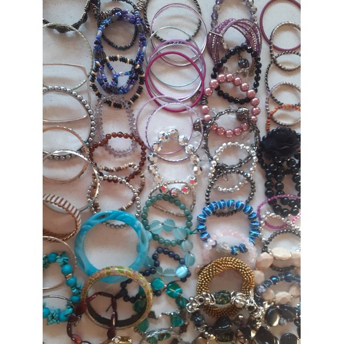 127 - A large quantity of modern and vintage fashion jewellery comprising unused High Street jewellery, mi... 