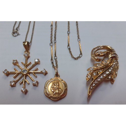 115 - A 9ct gold St Christopher pendant on a 22ct gold filled chain, total weight of both items 3.6g toget... 