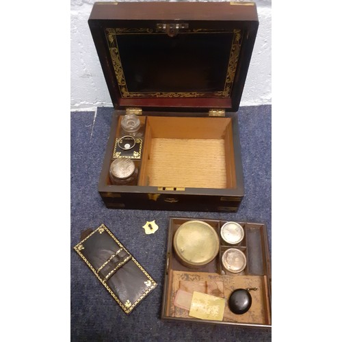 110 - A Victorian rosewood fitted vanity box and contents A/F. Location:T
Condition: The missing front bra... 