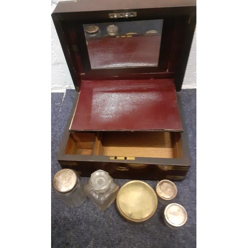 110 - A Victorian rosewood fitted vanity box and contents A/F. Location:T
Condition: The missing front bra... 