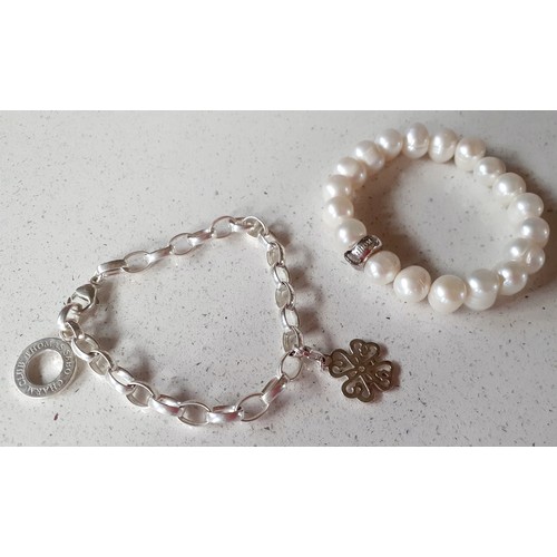 22 - Thomas Sabo-Two bracelets comprising a freshwater pearl bracelet with Sterling silver charm link (19... 