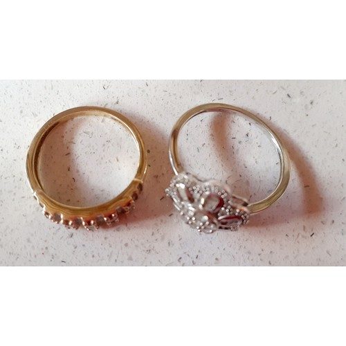 21 - Two modern and limited edition 9ct gold dress rings with certificates of authenticity comprising a 9... 