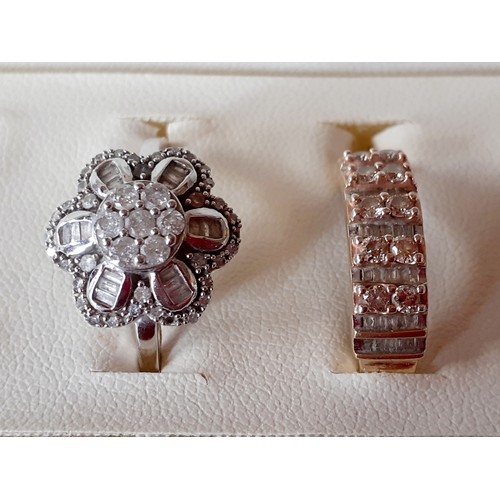 21 - Two modern and limited edition 9ct gold dress rings with certificates of authenticity comprising a 9... 