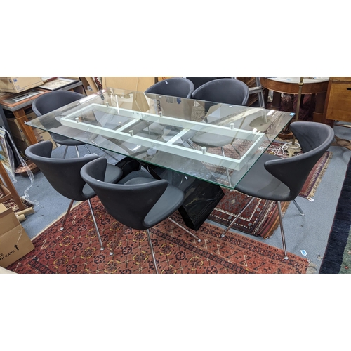 442 - A Tonon Casa Tokyo marble and glass topped dining table, 75cm h 200w, together with a set of six Ton... 