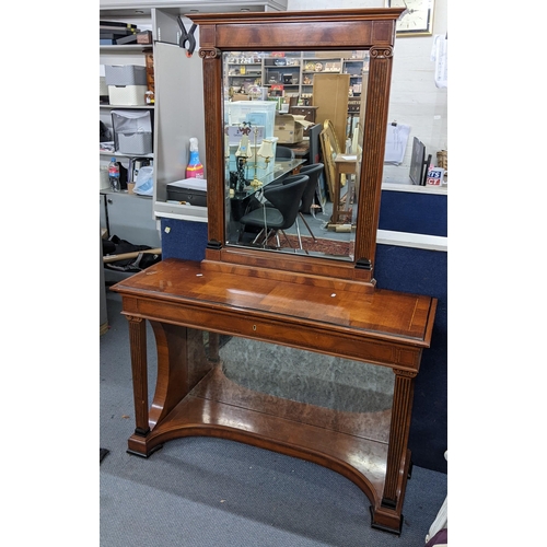 444 - A reproduction Biedermeier style mahogany hall table an matching mirror having cross banded veneer, ... 