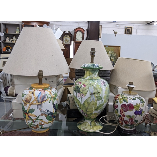 448 - Three modern porcelain table lamps with shades, decorated with birds, insects and fruit
Location: LW... 