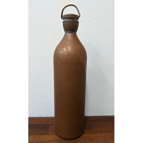 464 - A police truncheon, a brass bell and a hot water flask/bottle
Location: R2.1
If there is no conditio... 