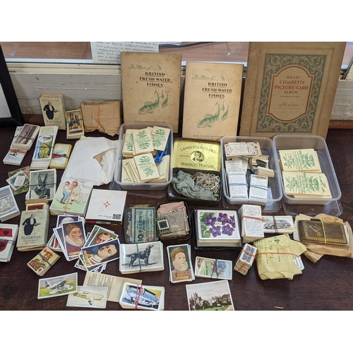 471 - Cigarette and sweet cards to include examples of British Freshwater fishes, butterflies and others
L... 