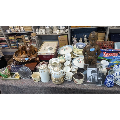 521 - A large mixed lot to include teasets, 19th century writing slope, fire companion set and other items... 