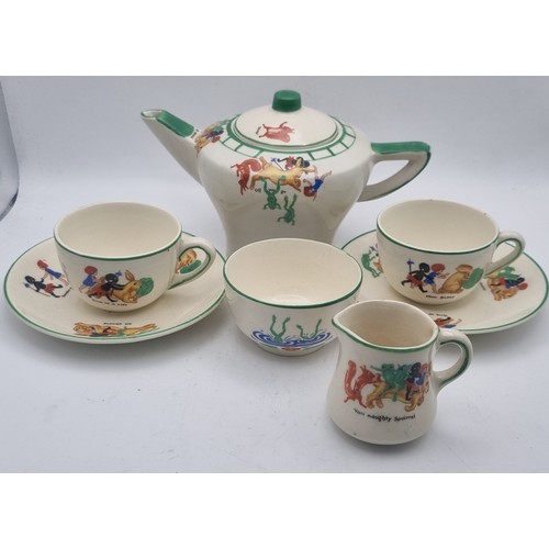 70 - An unused child's tea set Coronaware, with additional china cup featuring nursery rhyme characters, ... 