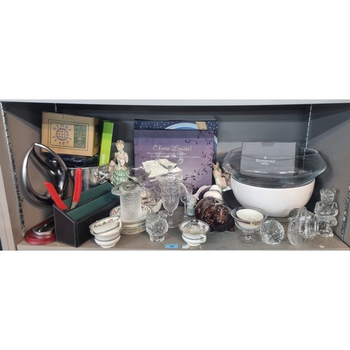 26 - A mixed lot of ceramics and glassware to include an Aynsley part tea set, A Lladro goose, an ice buc... 