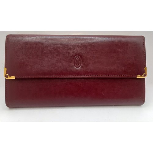 8 - Cartier- A Must de Cartier burgundy cowhide leather purse 19cm x 10cm with wallet and coin compartme... 