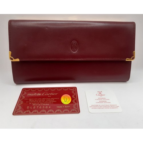 8 - Cartier- A Must de Cartier burgundy cowhide leather purse 19cm x 10cm with wallet and coin compartme... 