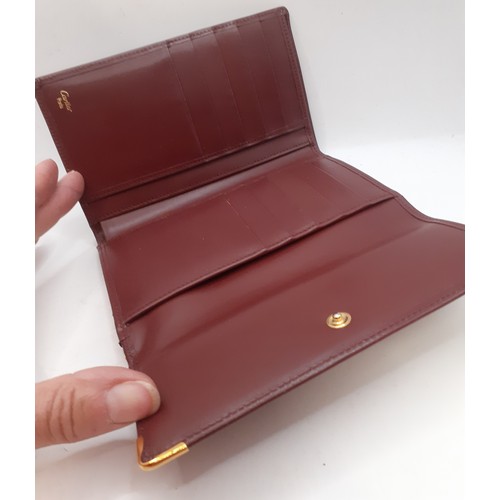 13 - Cartier- A Must de Cartier burgundy cowhide leather purse 15cm x 10cm with wallet and coin compartme... 