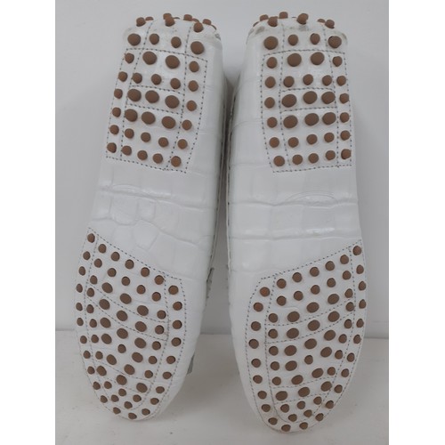 15 - Tods-A pair of  hardly worn ladies white fringed leather loafers in a crocodile design with gold ton... 