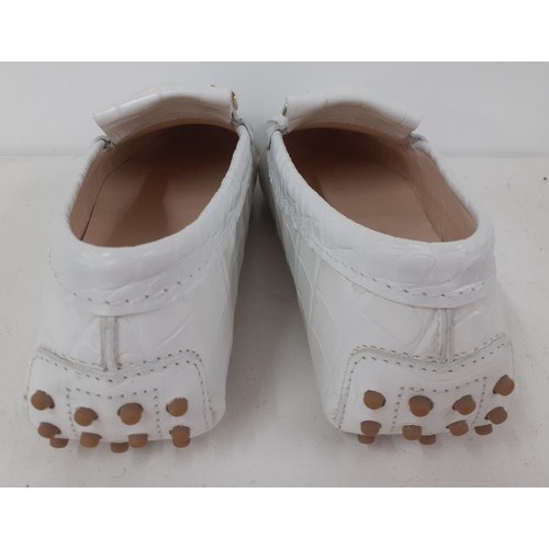 15 - Tods-A pair of  hardly worn ladies white fringed leather loafers in a crocodile design with gold ton... 