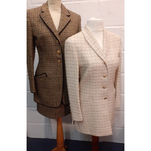 17 - Salvatore Ferragamo- A 1990's cream boucle wool and silk mix fitted jacket having 4 gold tone button... 