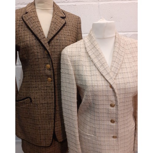 17 - Salvatore Ferragamo- A 1990's cream boucle wool and silk mix fitted jacket having 4 gold tone button... 