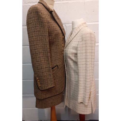 17 - Salvatore Ferragamo- A 1990's cream boucle wool and silk mix fitted jacket having 4 gold tone button... 