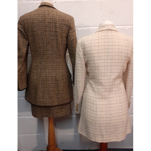 17 - Salvatore Ferragamo- A 1990's cream boucle wool and silk mix fitted jacket having 4 gold tone button... 