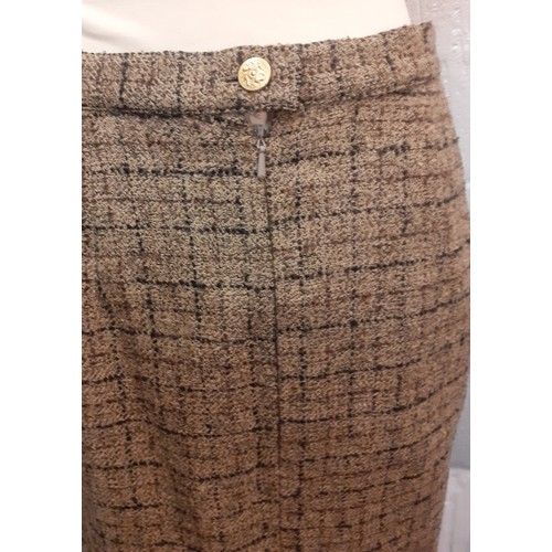 17 - Salvatore Ferragamo- A 1990's cream boucle wool and silk mix fitted jacket having 4 gold tone button... 