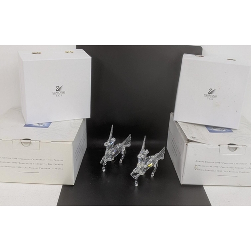 436 - ***THIS LOT HAS BEEN WITHDRAWN***Two boxed Swarovski Crystal Pegasus models Location:
If there is no... 