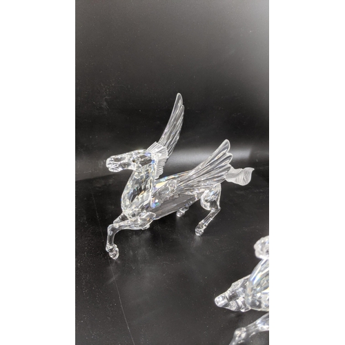 436 - ***THIS LOT HAS BEEN WITHDRAWN***Two boxed Swarovski Crystal Pegasus models Location:
If there is no... 