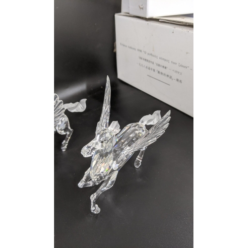 436 - ***THIS LOT HAS BEEN WITHDRAWN***Two boxed Swarovski Crystal Pegasus models Location:
If there is no... 