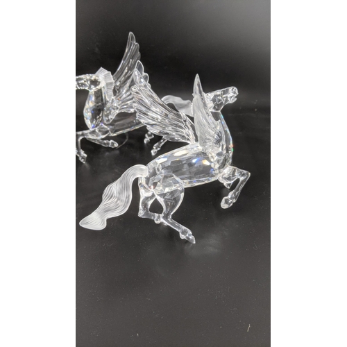 436 - ***THIS LOT HAS BEEN WITHDRAWN***Two boxed Swarovski Crystal Pegasus models Location:
If there is no... 