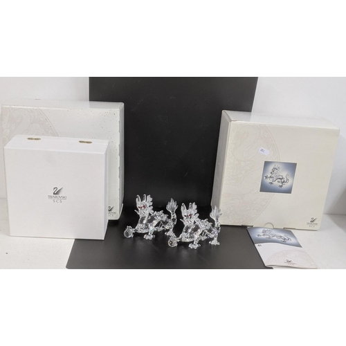 439 - ***THIS LOT HAS BEEN WITHDRAWN***Two boxed Swarovski Crystal dragons Location:
If there is no condit... 