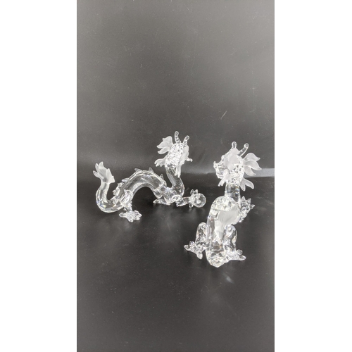 439 - ***THIS LOT HAS BEEN WITHDRAWN***Two boxed Swarovski Crystal dragons Location:
If there is no condit... 