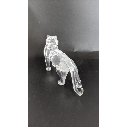 442 - ***THIS LOT HAS BEEN WITHDRAWN***Four boxed Swarovski Crystal examples to include a pair of Lions, a... 