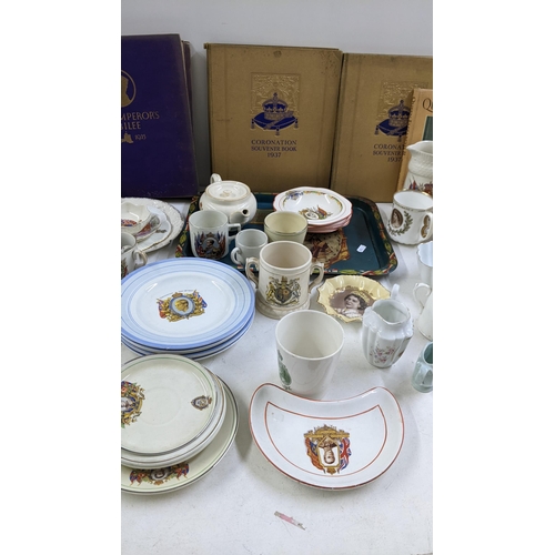 459 - A large mixed lot of 19th century and later commemorative porcelain, together with Royal related boo... 