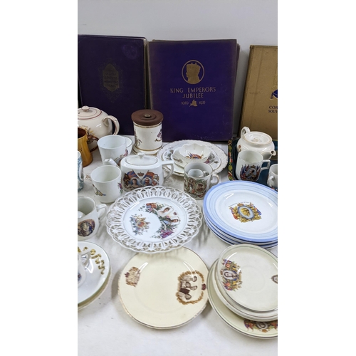 459 - A large mixed lot of 19th century and later commemorative porcelain, together with Royal related boo... 