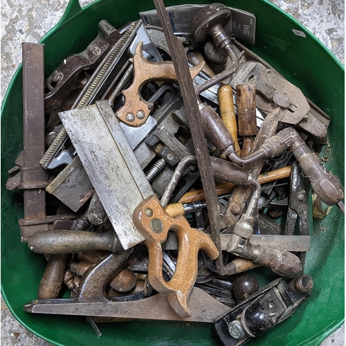 486 - A selection of vintage tools to include a Lloyd Davies saw, clamps, Stanley woodworking plane and ot... 