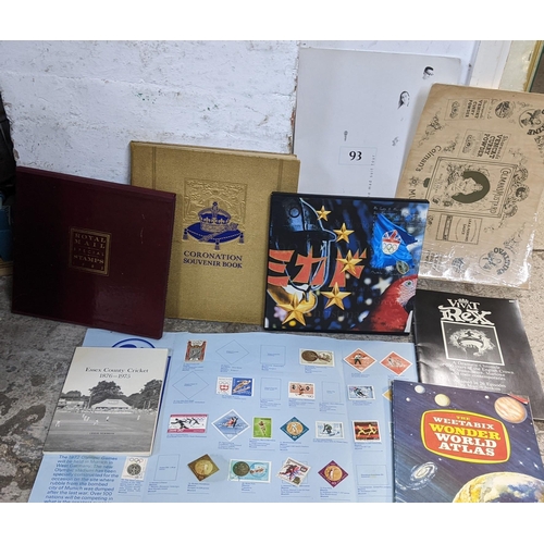 495 - A mixed lot to include a 1985 and a 1992 Royal Mail Special stamp book, a Coronation souvenir book a... 