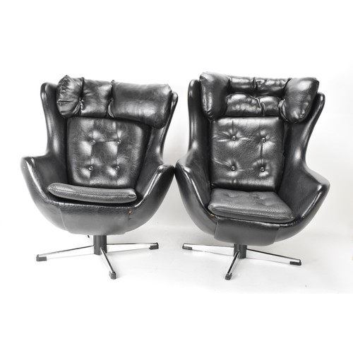 487 - Two Parker Knoll 1980s retro Arne Jacobsen style children's swivel chairs, each with black leather b... 