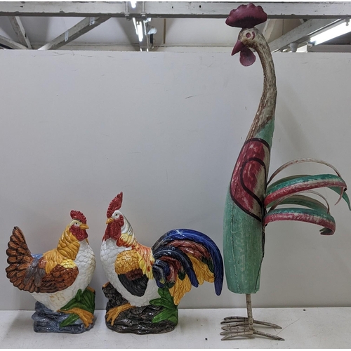 500 - A pair of porcelain models of cockerels, together with a large metal model of a cockerel Location:SL... 