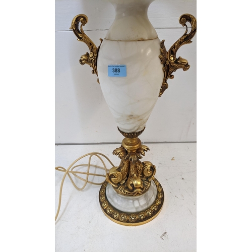 471 - A mid 20th century gilt metal and alabaster Italian style lamp, decorated with fish, 63cm h
Location... 