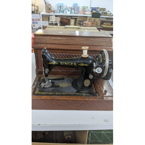 501 - Three vintage sewing machines to include 2 Singer machines; a 1910 '15k' model, serial number F71717... 