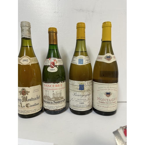 278 - Four bottles of white wine to include Puligny Montradet 1992, Sancerre 19987, Bourgogne 1985, Montag... 