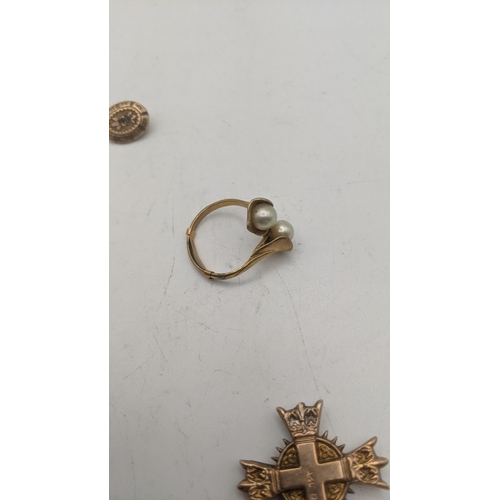 105 - A gold and pear ring stamped 10K 3.6g, together with a cross pendant and a gold plated stud total we... 