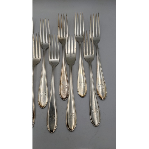 115 - A set of 15 silver forks stamped 800 with engraved initials 'V-B' to the terminals' total weight 597... 