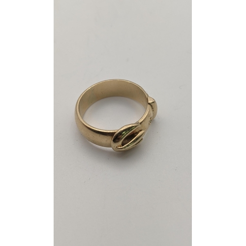 118 - A 9ct gold buckle ring, size L 1/2, 4.7g
Location: CAB 3
If there is no condition report shown, plea... 