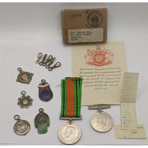 129 - A selection of 5 silver fobs to include fobs relating to darts competitions and others total weight ... 