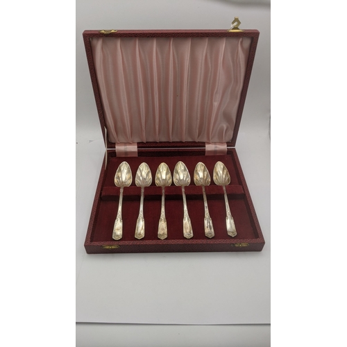 130 - A set of six silver grapefruit spoons hallmarked Sheffield 1954 in a fitted case, total weight 171.5... 