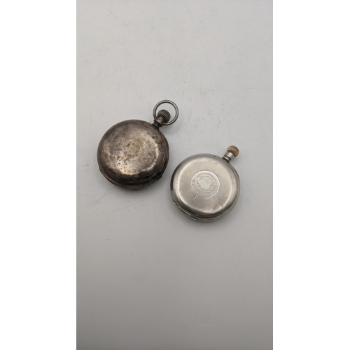 135 - Two early 20th century silver open faced keyless wound pocket watches, one having a signed dial, ins... 